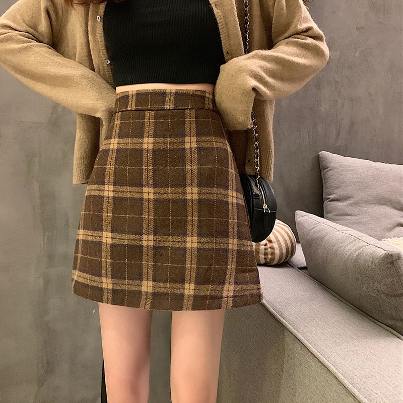 Plaid A-line skirt tight-fitting pure lust style hot girl style sexy light luxury age reduction slimming high waist ins elastic waist straight skirt