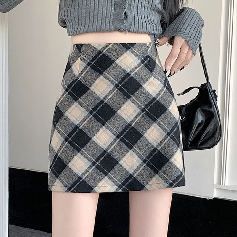 Niche plaid A-line skirt tight-fitting pure lust hottie sexy anti-exposure high-waisted elastic waist-covering straight skirt