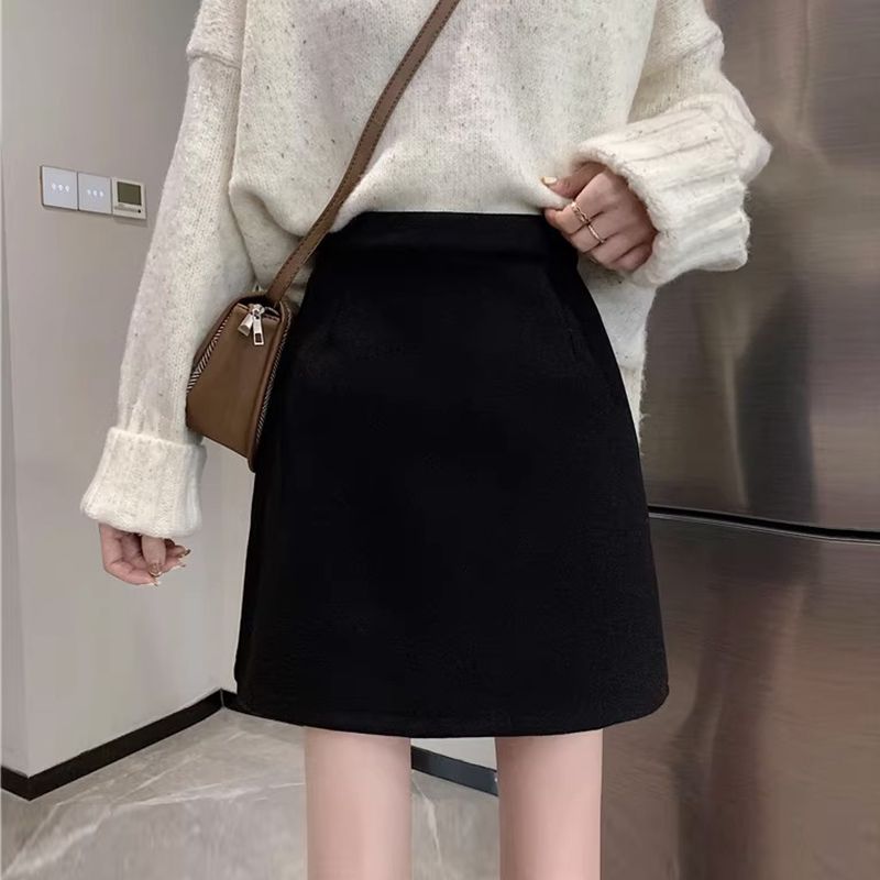 Small solid color, versatile, fashionable, slim, high-waisted, elastic waist, anti-exposure, age-reducing, cross-body A-line straight skirt