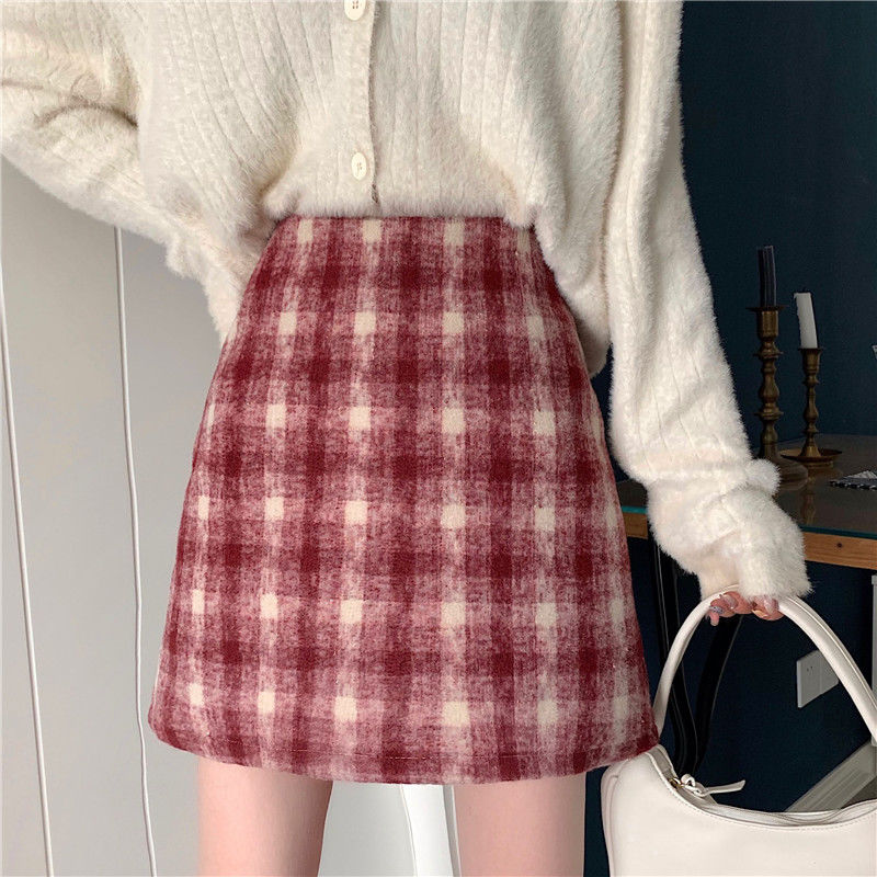 Xiaoxiang style patterned A-line skirt covers the sexy and tight-fitting pure lust style hot girl style light luxury foreign style elastic waist straight skirt