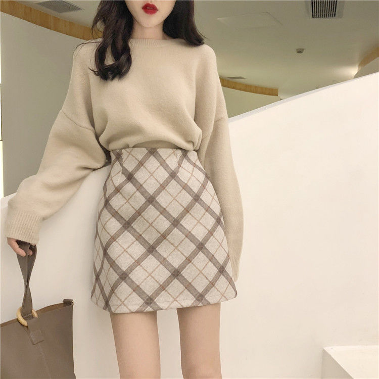 Celebrity Hong Kong style niche plaid A-line skirt is designed to prevent exposure and slimming, covering the cross and covering the belly ins one-line skirt straight skirt