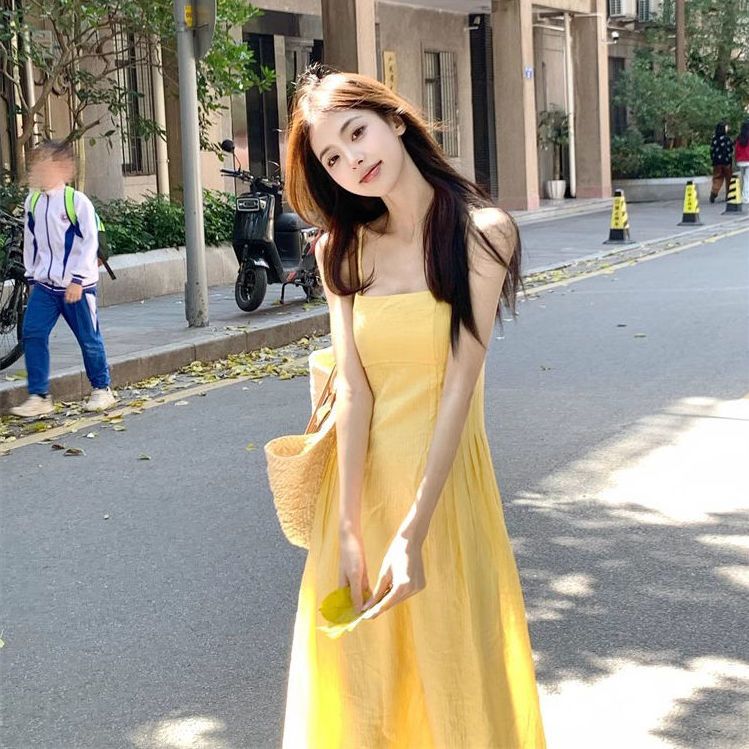 Gentle style yellow suspender dress for women summer French style waist slimming A-line skirt seaside vacation long dress