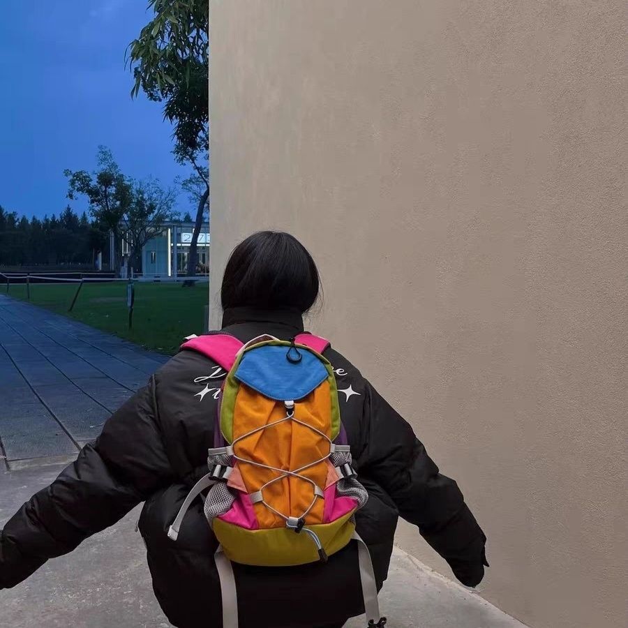 Niche designer regnbue kontrastfarvet rygsæk udendørs fritid vandretaske mænd og kvinders multifunktionelle rejserygsæk bagage_voghion.com