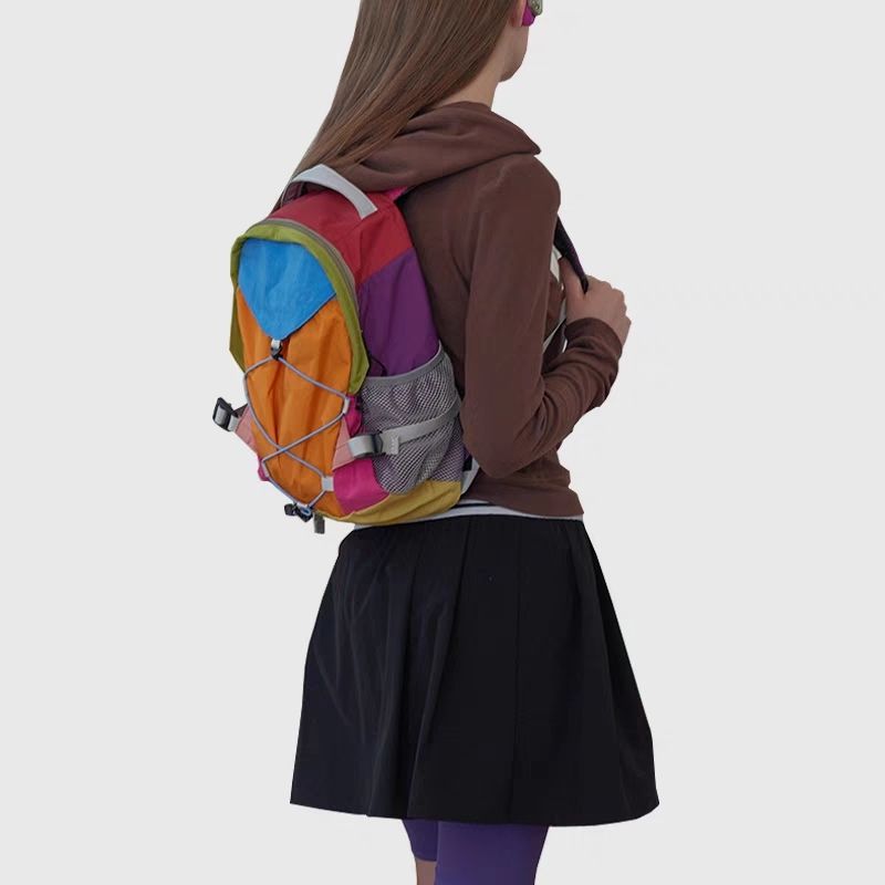 Niche designer regnbue kontrastfarvet rygsæk udendørs fritid vandretaske mænd og kvinders multifunktionelle rejserygsæk bagage_voghion.com