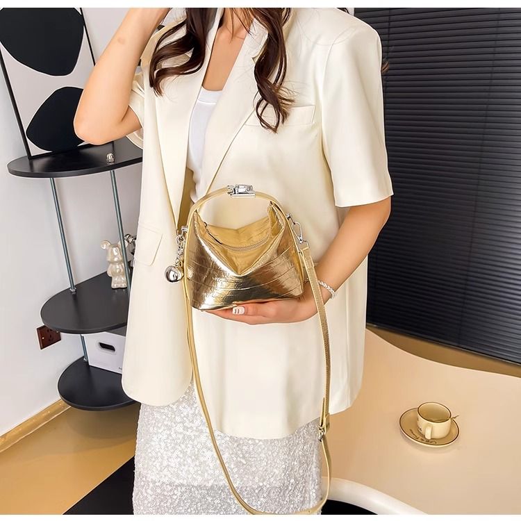 H7 Borsa a mano in argento da donna, nuova alla moda, alta bellezza, tracolla mini, borsa a secchiello popolare di quest'anno_voghion.com