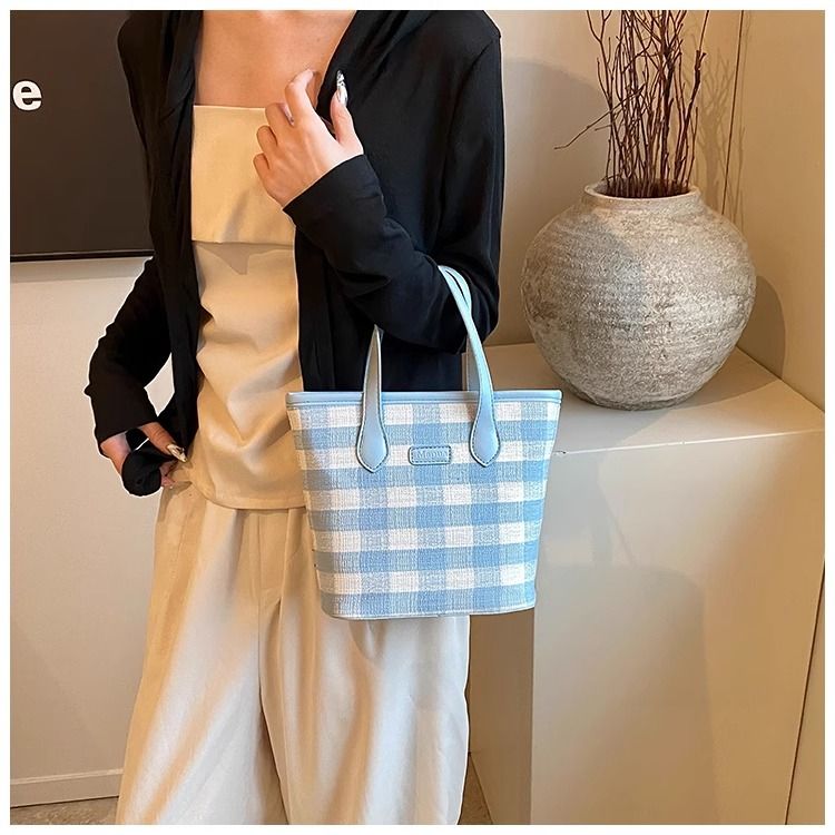 FOUR ONE färgblockerande nischrutig för kvinnor, ny mångsidig axelväska, superpopulär handhållen bucket bag_voghion.com