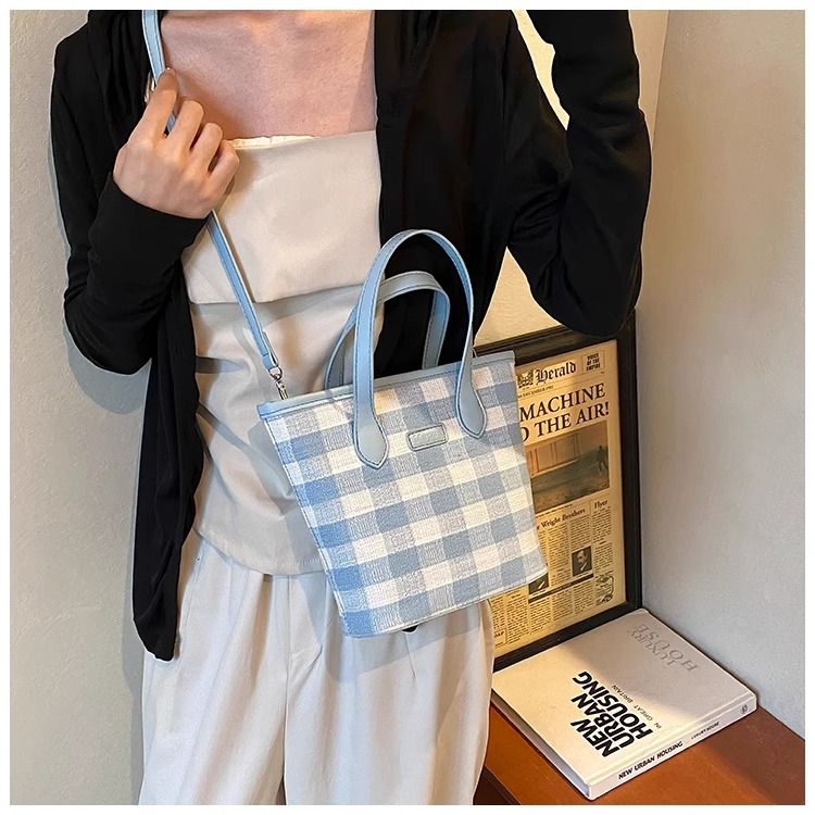 FOUR ONE färgblockerande nischrutig för kvinnor, ny mångsidig axelväska, superpopulär handhållen bucket bag_voghion.com