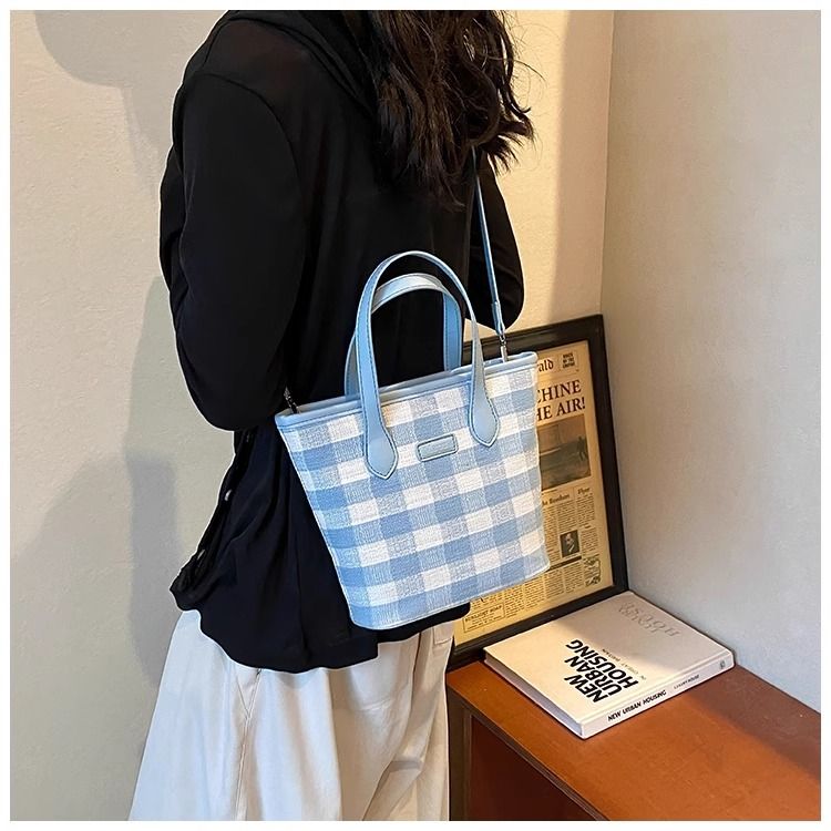 FOUR ONE färgblockerande nischrutig för kvinnor, ny mångsidig axelväska, superpopulär handhållen bucket bag_voghion.com