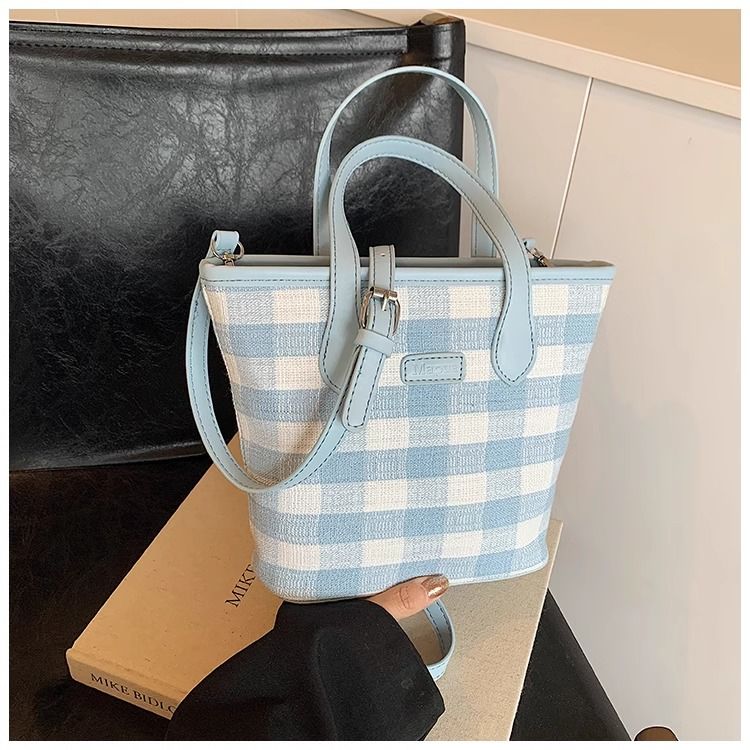 FOUR ONE färgblockerande nischrutig för kvinnor, ny mångsidig axelväska, superpopulär handhållen bucket bag_voghion.com