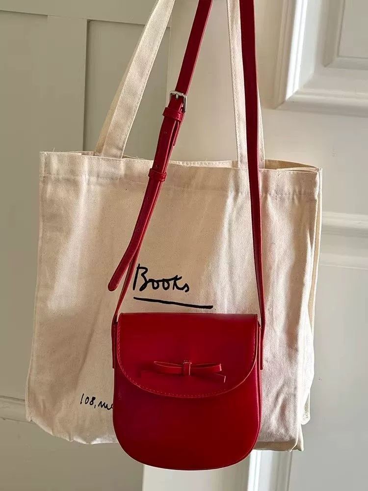 CHARHP&KEJNT Design Bogen Sattel Mode Vielseitig Single Schulter Crossbody Tasche Premium_voghion.com