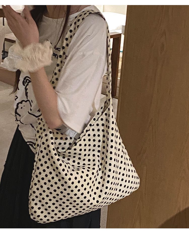Borsa a secchiello grande capiente in tela floreale dello stesso stile di Zhang Ruonan per l'estate 2024, nuova tote coreana alla moda da donna_voghion.com