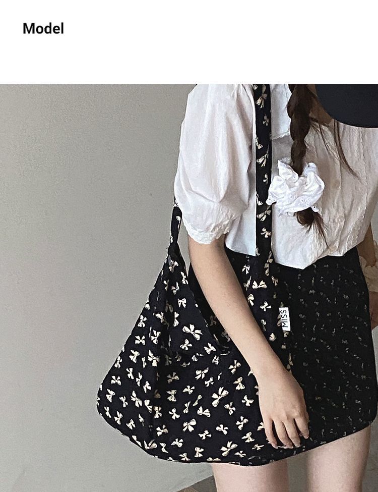 Borsa a secchiello grande capiente in tela floreale dello stesso stile di Zhang Ruonan per l'estate 2024, nuova tote coreana alla moda da donna_voghion.com