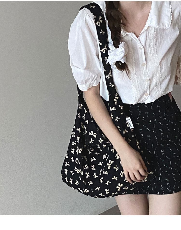 Borsa a secchiello grande capiente in tela floreale dello stesso stile di Zhang Ruonan per l'estate 2024, nuova tote coreana alla moda da donna_voghion.com