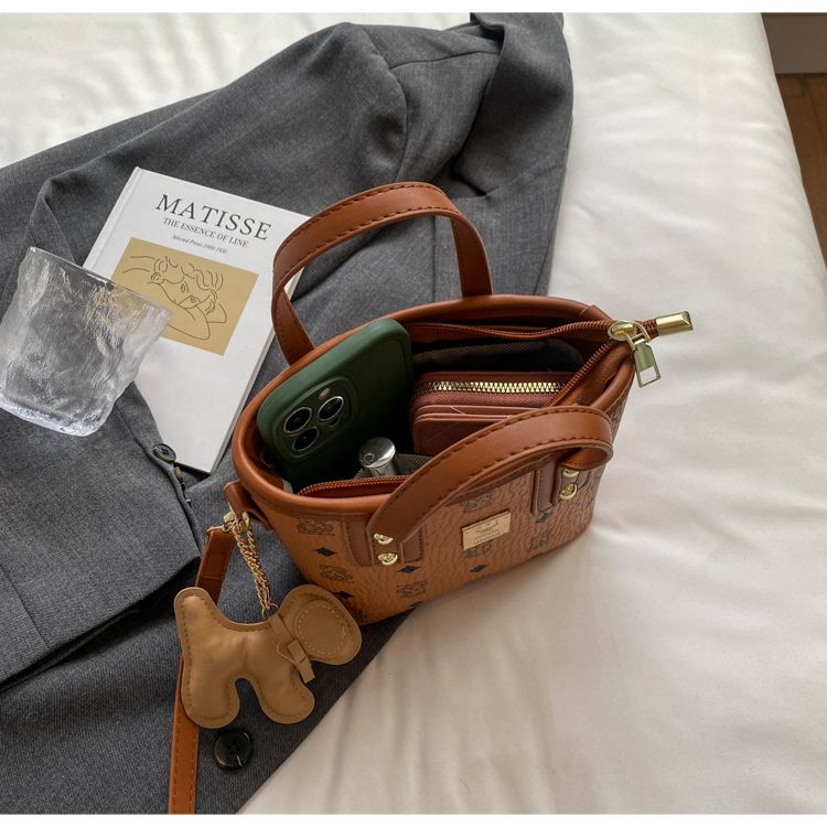 Borsa a secchiello donna alla moda con tracolla e manico_voghion.com