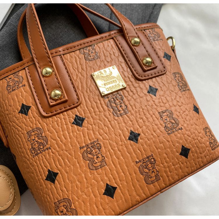 Borsa a secchiello donna alla moda con tracolla e manico_voghion.com