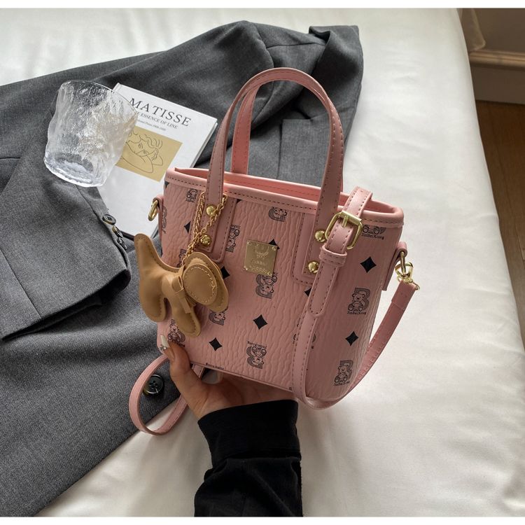 Borsa a secchiello donna alla moda con tracolla e manico_voghion.com