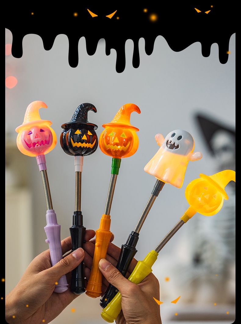 Halloween pumpkin lanterns, glowing hand cranked sticks, decorative props, ghost children's gifts, bar party scene_voghion.com