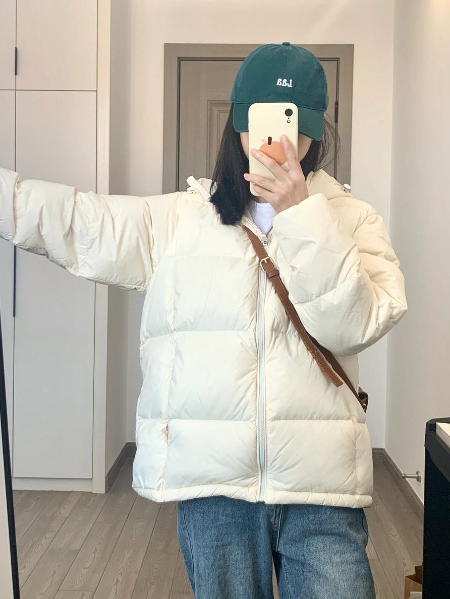 Doudoune courte blanche style hiver 2025 pour femme, à capuche, ample, chaude, pour couple, manteau épais_voghion.com