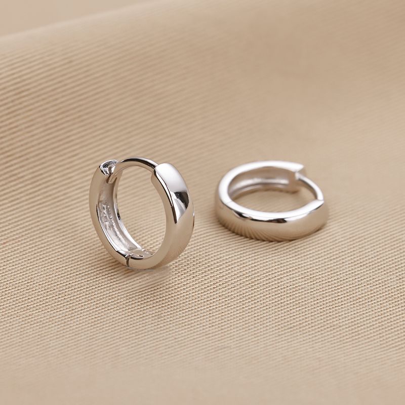 Genuine S999 sterling silver earrings for women simple niche design plain ring glossy ear buckles without removal anti-allergic foot silver ear studs