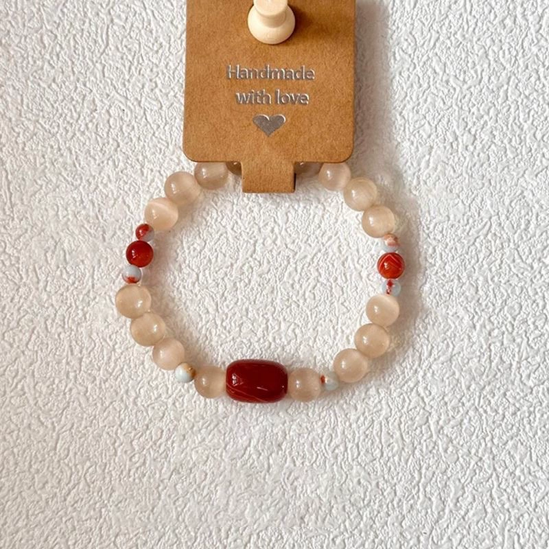 Bracciale con perle occhio di gatto rosso stile cinese vintage_voghion.com