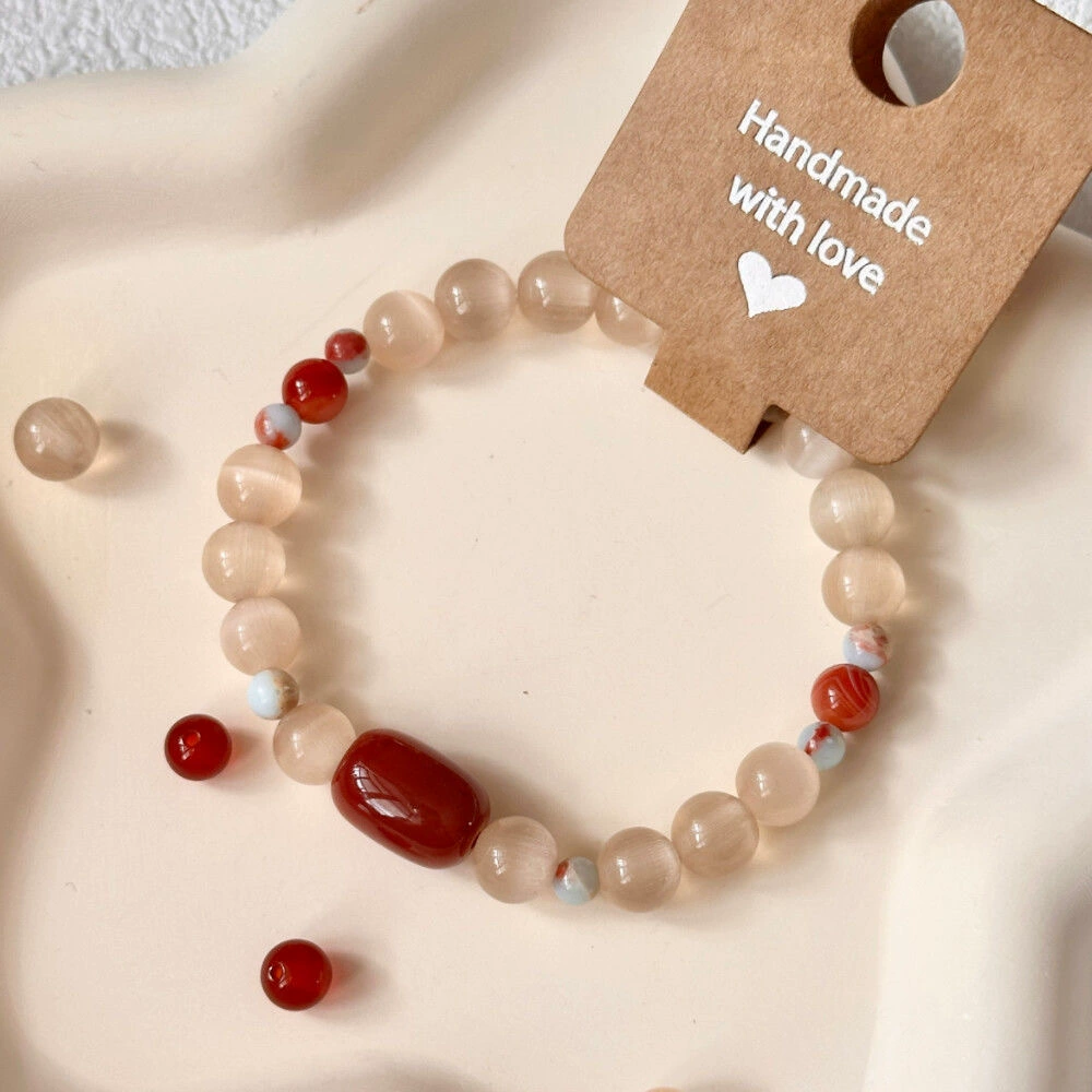 Bracciale con perle occhio di gatto rosso stile cinese vintage_voghion.com