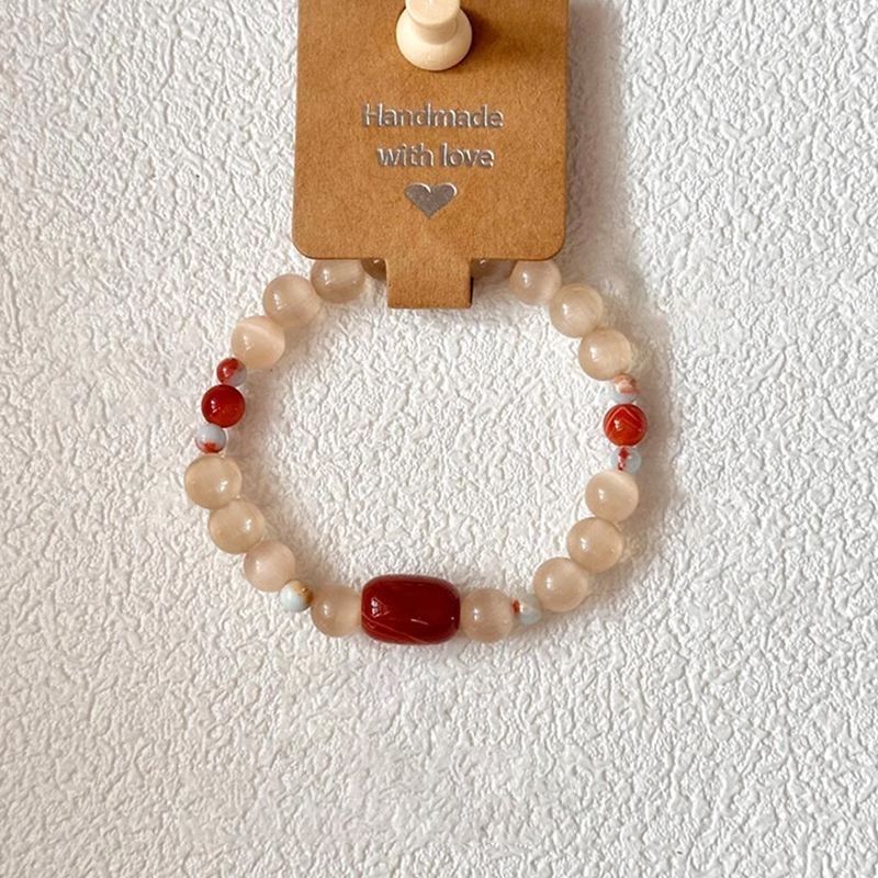 Bracciale con perle occhio di gatto rosso stile cinese vintage_voghion.com