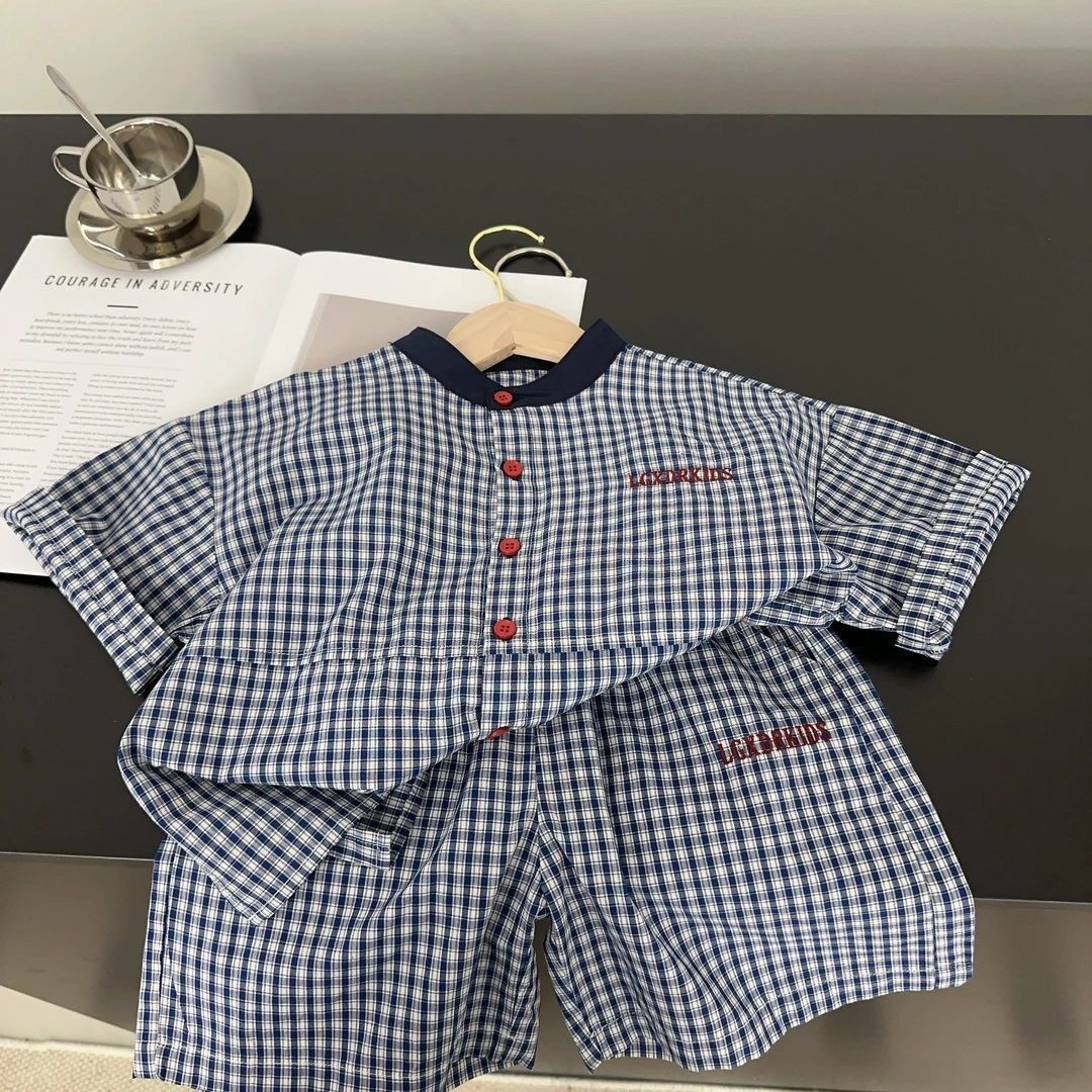 Completo estivo da bambino con pantaloncini a quadri e camicia_voghion.com