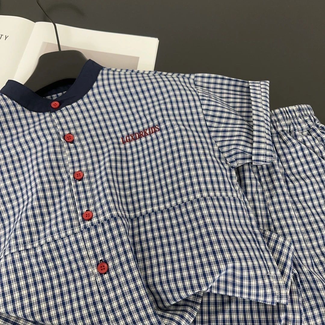 Completo estivo da bambino con pantaloncini a quadri e camicia_voghion.com