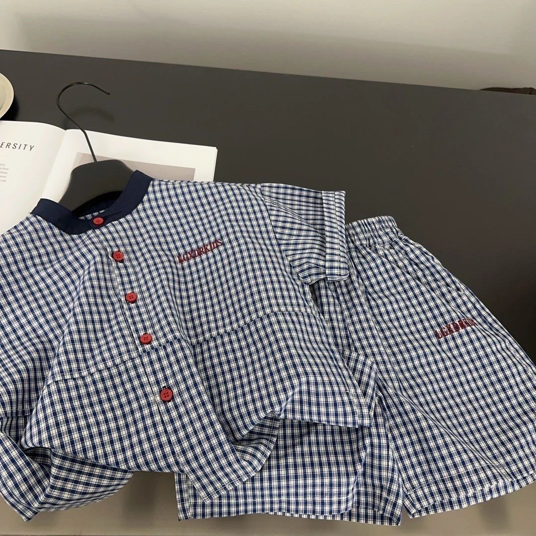 Completo estivo da bambino con pantaloncini a quadri e camicia_voghion.com