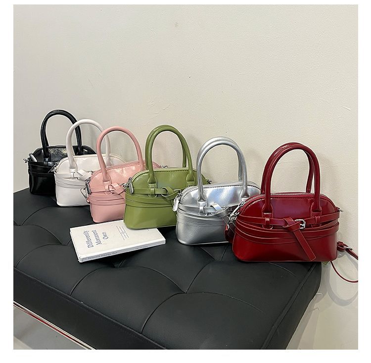 Borsa a tracolla da donna in pelle a forma di conchiglia_voghion.com