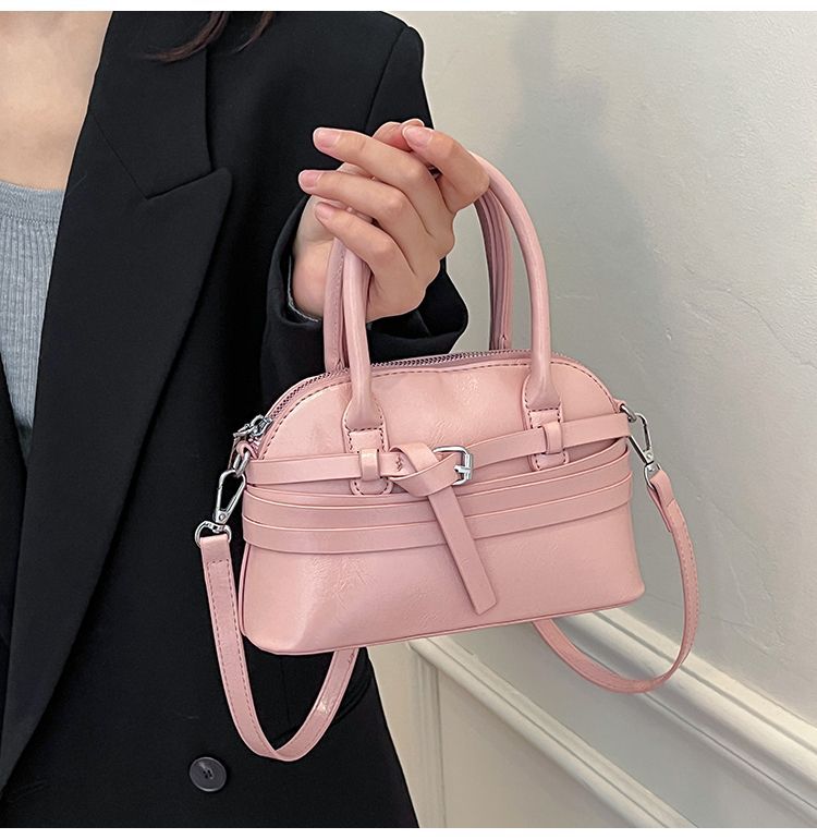 Borsa a tracolla da donna in pelle a forma di conchiglia_voghion.com