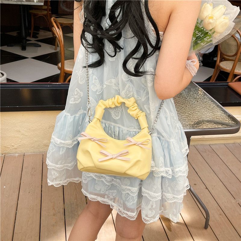 Borsa a tracolla elegante con fiocco colori a contrasto e catena_voghion.com
