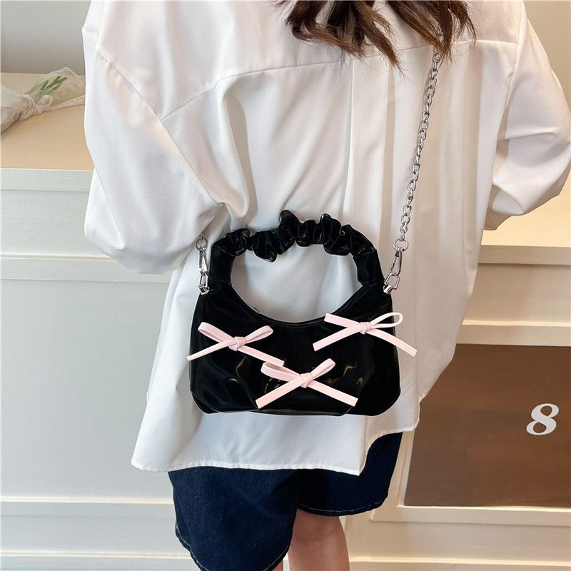 Borsa a tracolla elegante con fiocco colori a contrasto e catena_voghion.com