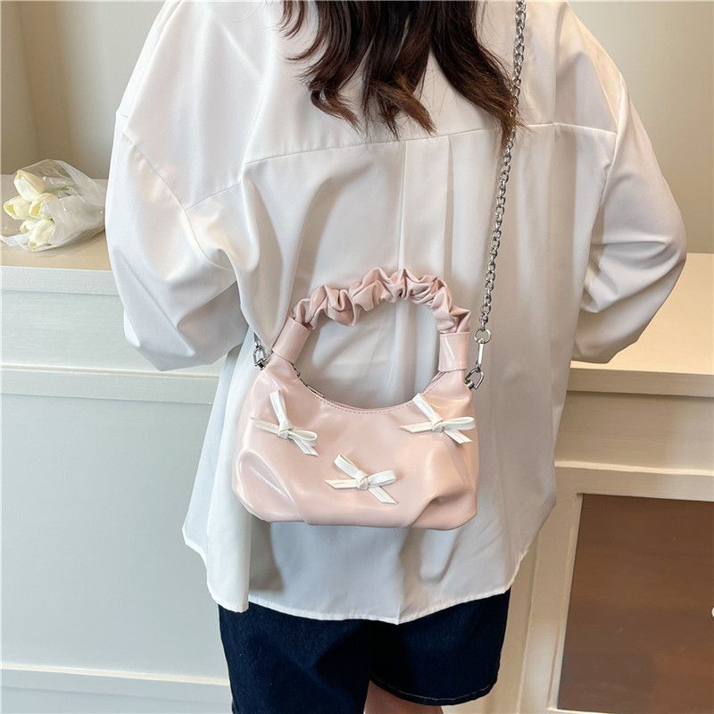 Borsa a tracolla elegante con fiocco colori a contrasto e catena_voghion.com
