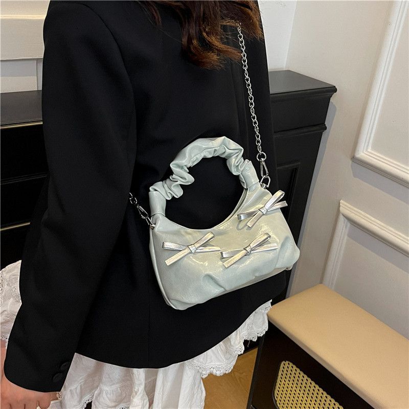 Borsa a tracolla elegante con fiocco colori a contrasto e catena_voghion.com