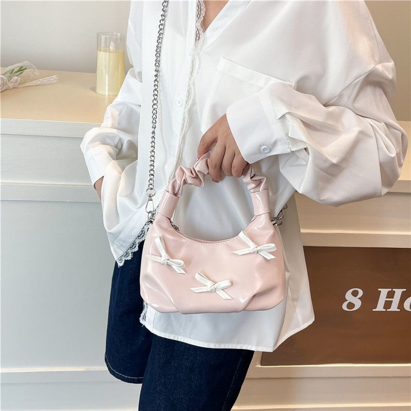 Borsa a tracolla elegante con fiocco colori a contrasto e catena_voghion.com