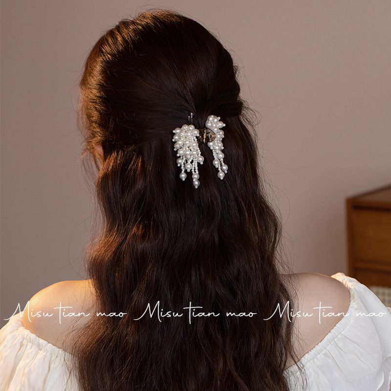 Elegante pinza para el pelo con borla de perlas para recogidos_voghion.com