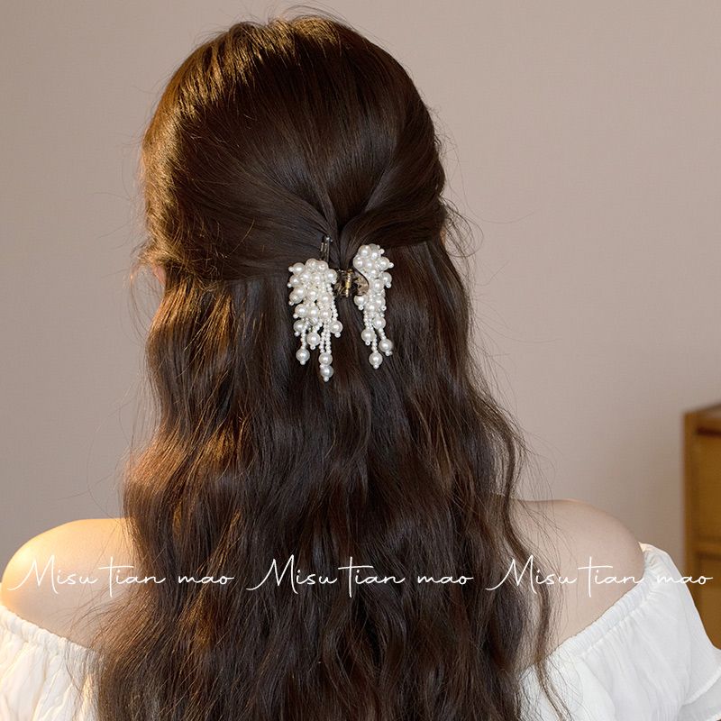 Elegante pinza para el pelo con borla de perlas para recogidos_voghion.com