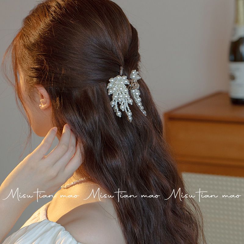 Elegante pinza para el pelo con borla de perlas para recogidos_voghion.com