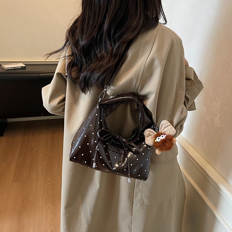 Borsa elegante di alta gamma, nuovo modello 2025, nicchia, lusso leggero, borsa a tracolla semplice e versatile, ideale da portare a spalla o a tracolla._voghion.com