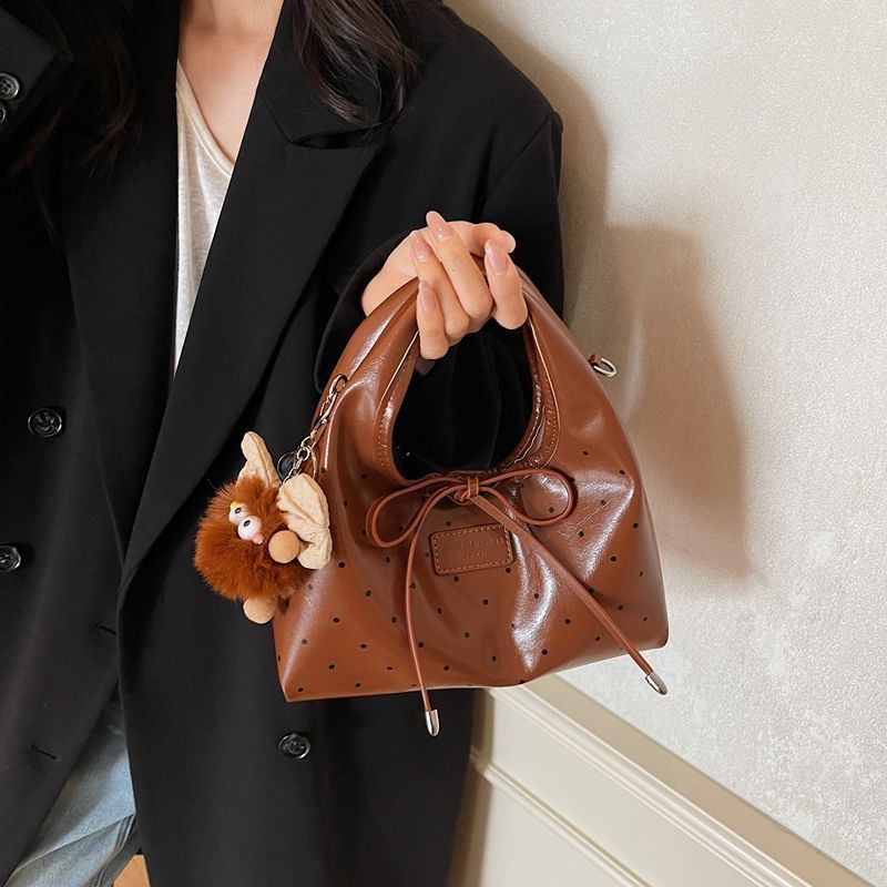 Borsa elegante di alta gamma, nuovo modello 2025, nicchia, lusso leggero, borsa a tracolla semplice e versatile, ideale da portare a spalla o a tracolla._voghion.com