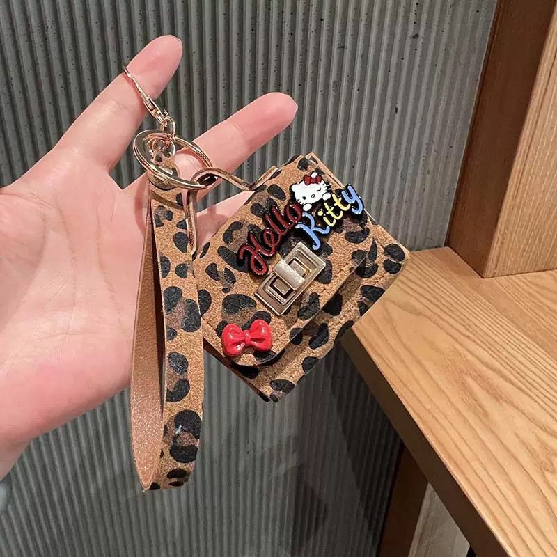 新款复古豹纹猫咪耳机包挂件时尚甜酷汽车钥匙扣挂饰耳机保护套