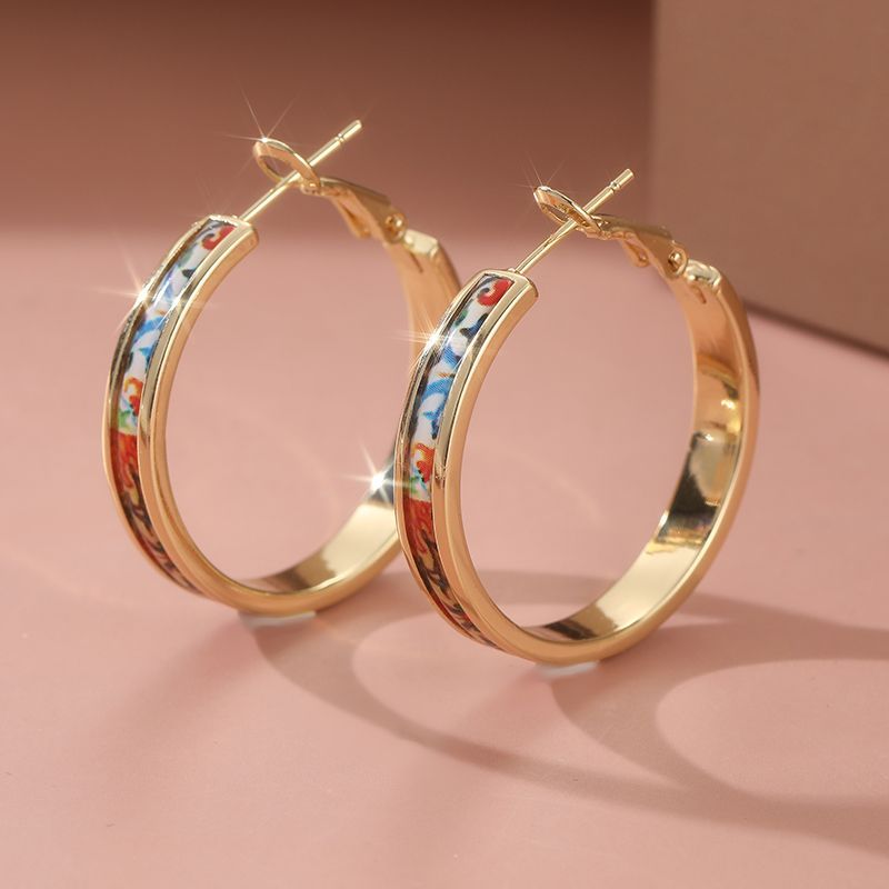 Orecchini a cerchio grandi in smalto vintage, design artistico di nicchia unico, accessorio versatile_voghion.com