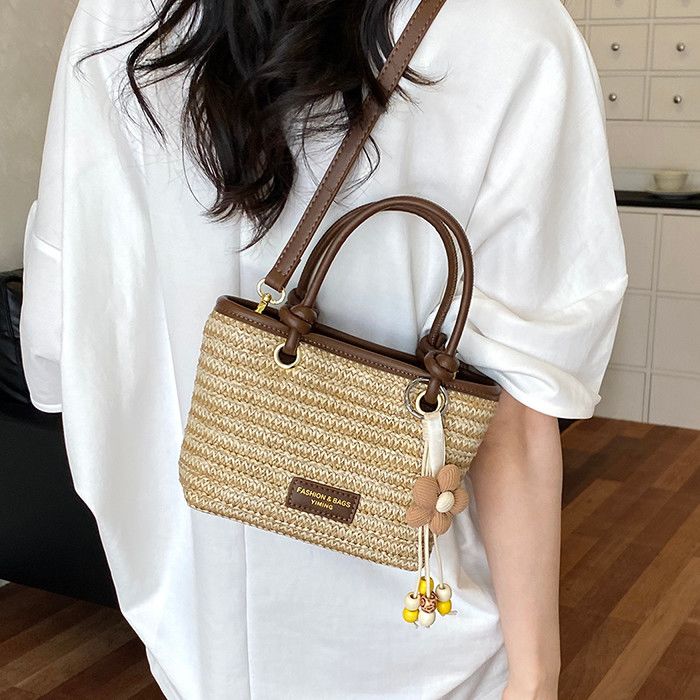 Cestino in paglia intrecciata piccolo da donna, nuovo modello 2026, borsa a mano a righe con blocchi di colore, secchiello, borsa a tracolla estiva con texture_voghion.com
