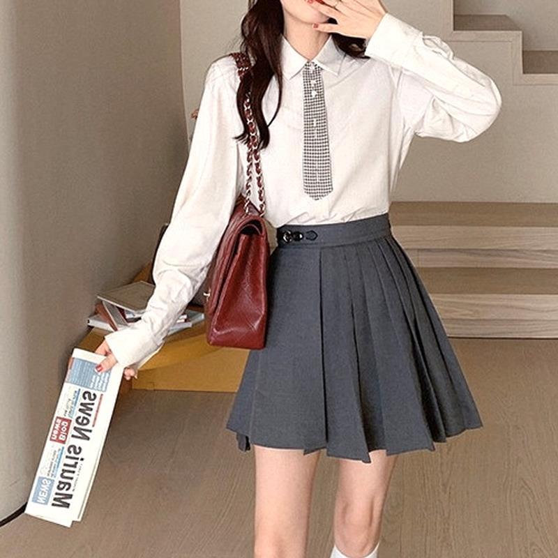 Retro Hong Kong style shirt female design sense niche early spring  new college style all-match striped long-sleeved top