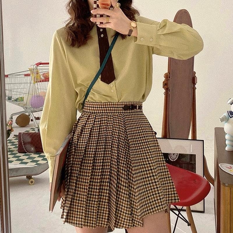 Retro Hong Kong style shirt female design sense niche early spring  new college style all-match striped long-sleeved top