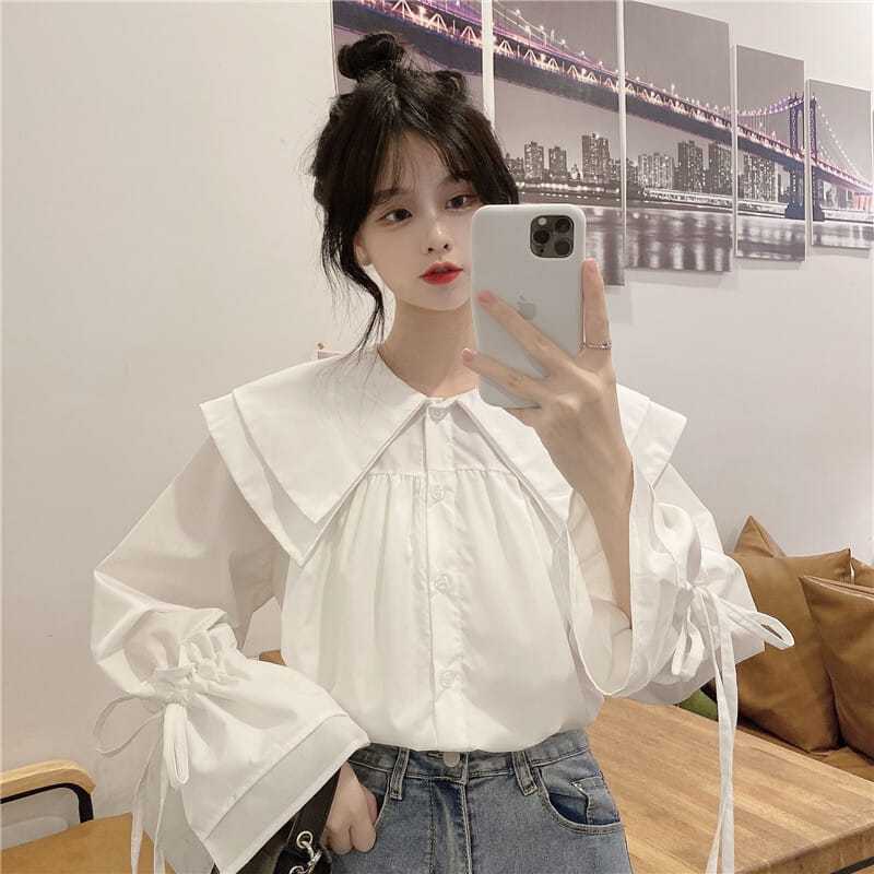 Japanese sweet white shirt female 2023 early autumn new loose doll collar long-sleeved shirt spring and autumn bottoming top