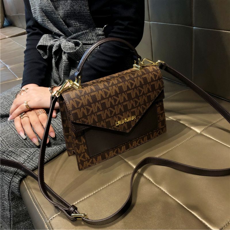 aj香港品牌包包女斜挎包2021新款真皮时尚简约手提包韩版单肩小方