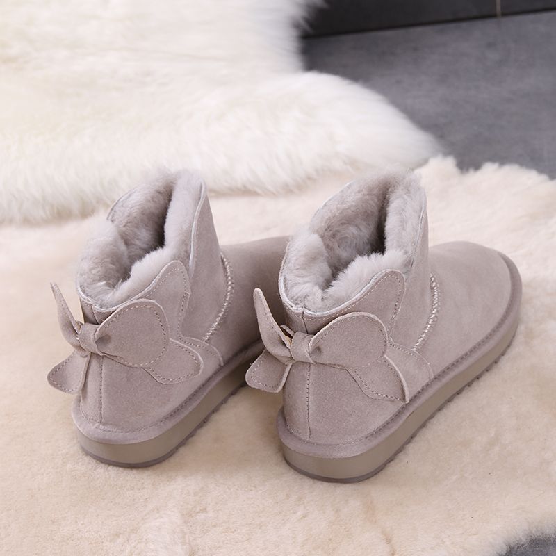 蝴蝶结雪地靴女厚底防滑可爱软萌平底短筒潮牛皮加绒保暖加厚棉鞋