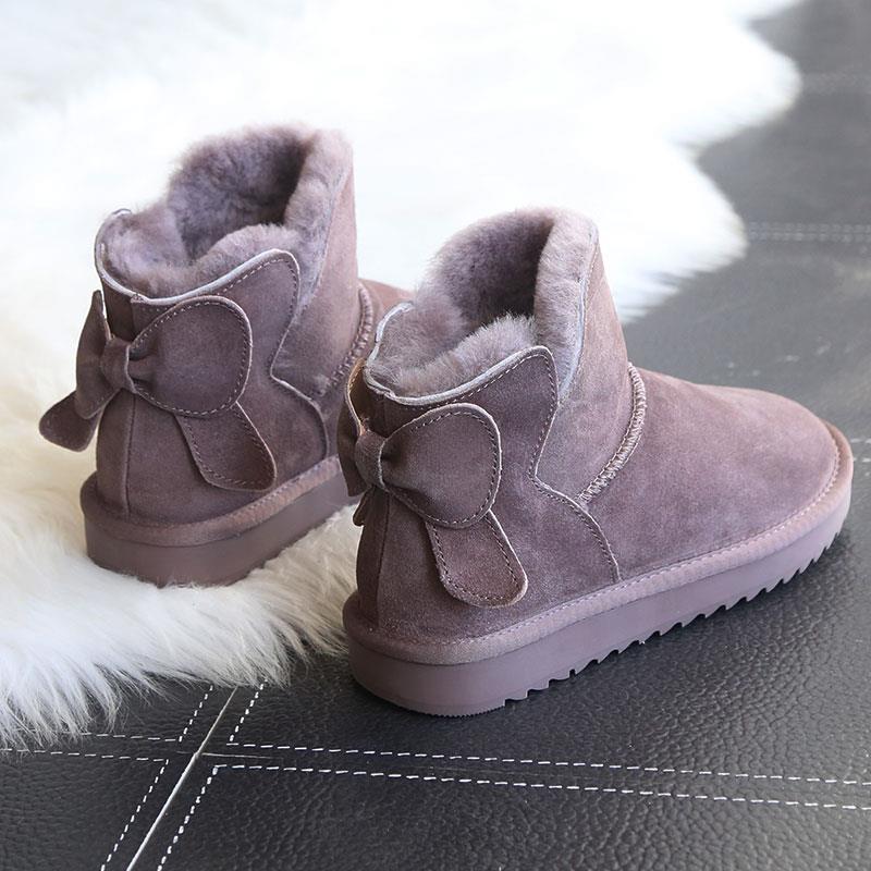 蝴蝶结雪地靴女皮毛一体短筒可爱软萌真皮羊毛加绒棉鞋保暖面包鞋
